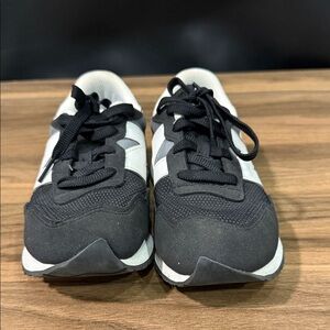 New Balance black and white sneakers